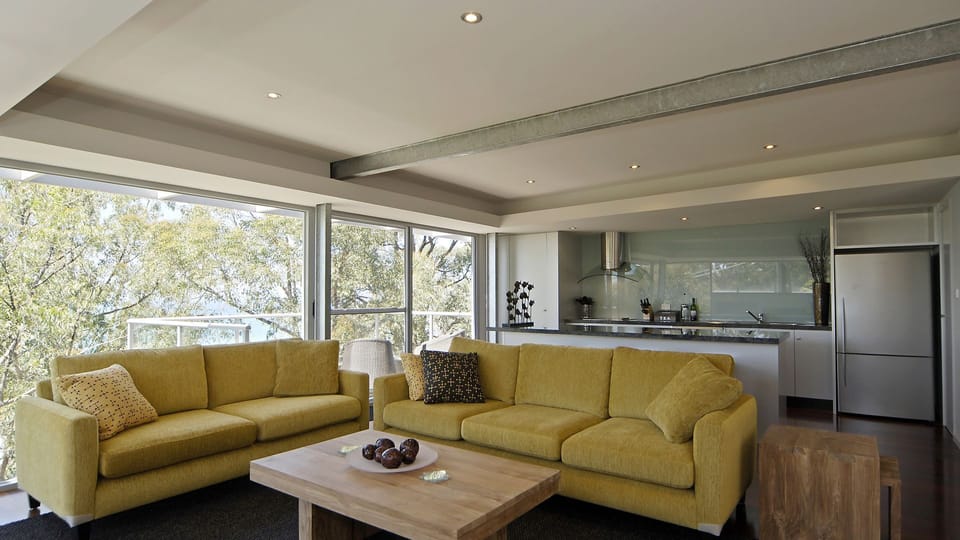 Relax in a comfortable lounge with views to Lorne