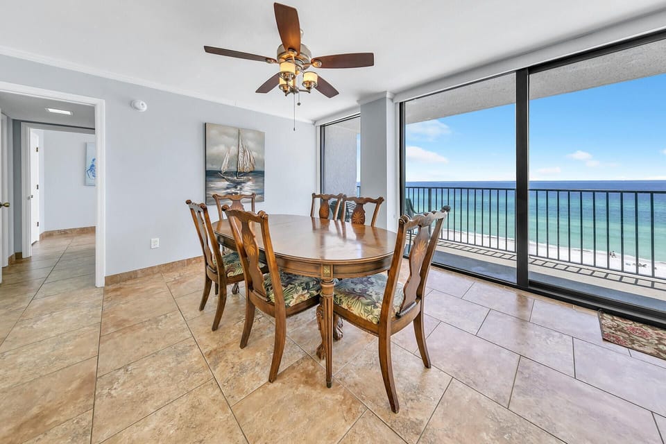 Eat at the table with a view of the Gulf