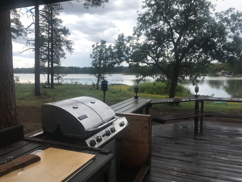 Grill on large deck
seating and lights