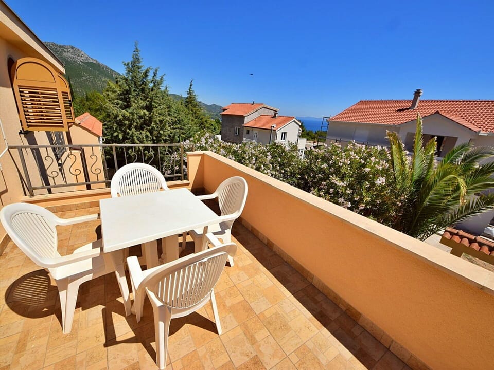 Sky, Furniture, Building, Plant, Table, Chair, Wood, Outdoor Furniture, Outdoor Table, House