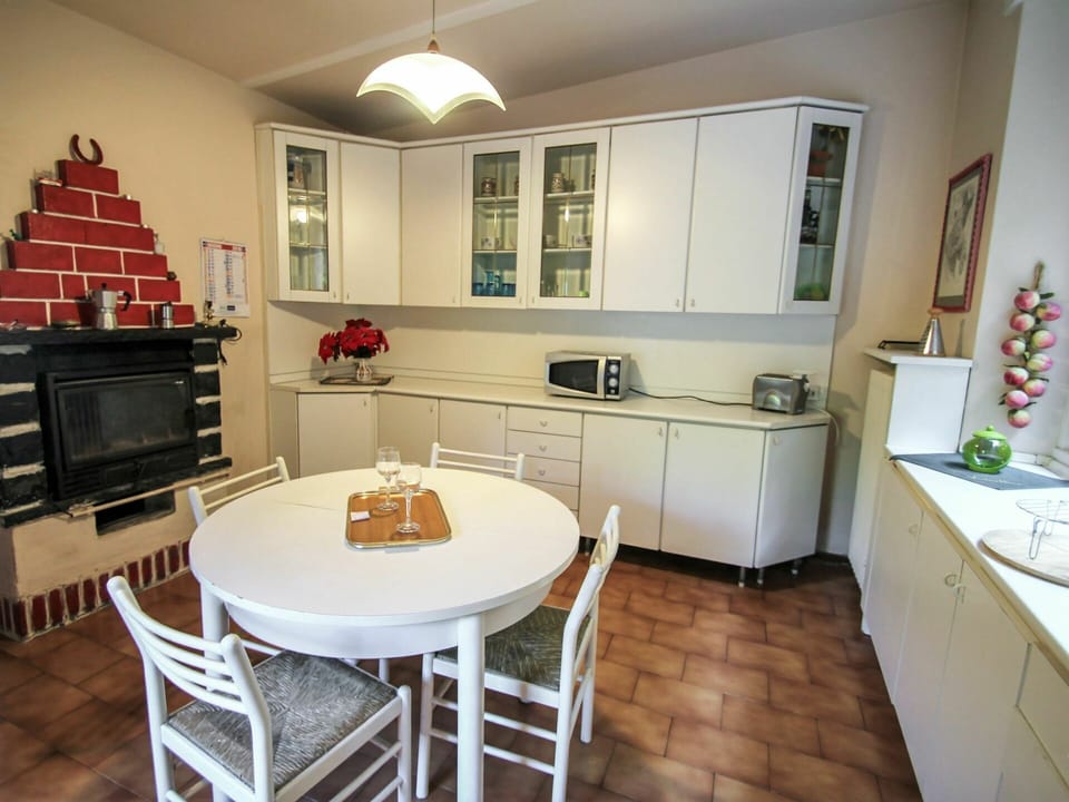 Cabinetry, Furniture, Table, Countertop, Wood, Sink, Kitchen, Lighting, Interior Design, Flooring