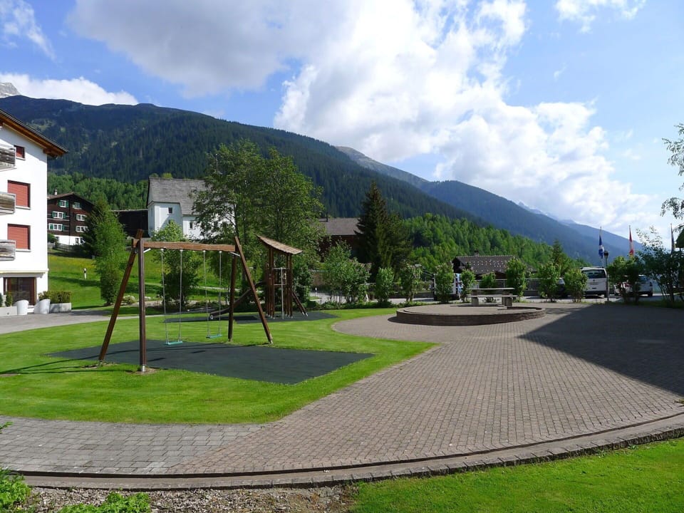 Cloud, Sky, Plant, Building, Mountain, Window, Tree, Land Lot, Urban Design, Road Surface