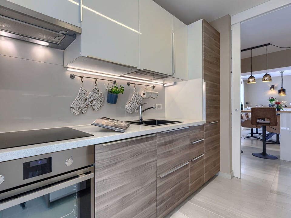 Kitchen, Countertop, Cabinetry, Kitchen Appliance, Interior Design, Flooring, Major Appliance, Wood, Sink, Furniture