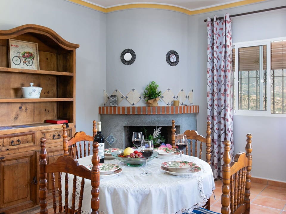 Table, Furniture, Property, Wood, Interior Design, Chair, Decoration, Cabinetry, Yellow, Tablecloth