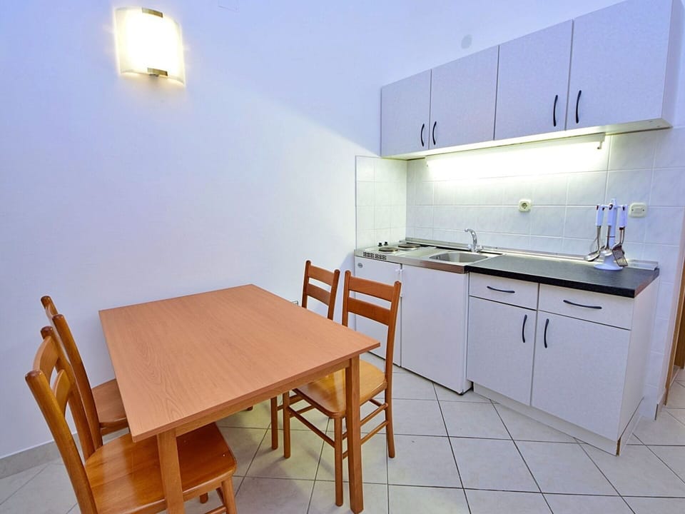 Cabinetry, Sink, Furniture, Countertop, Kitchen Sink, Tap, Table, Chair, Wood, Interior Design