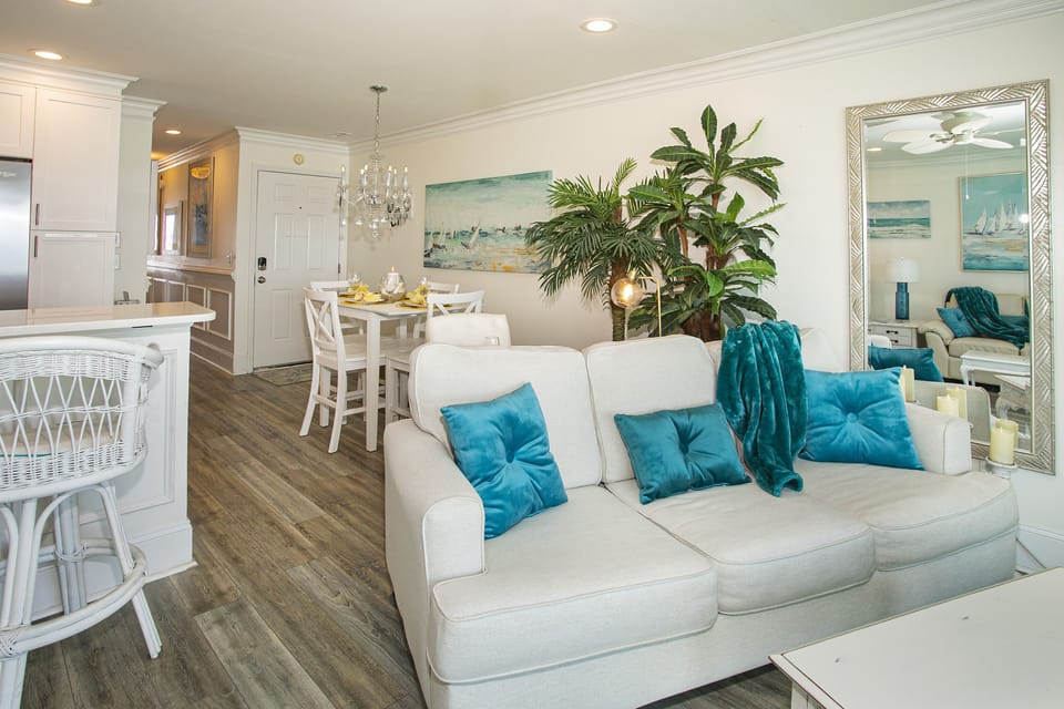 Large mirror beautifully reflects all that natural light & the oceanfront view 