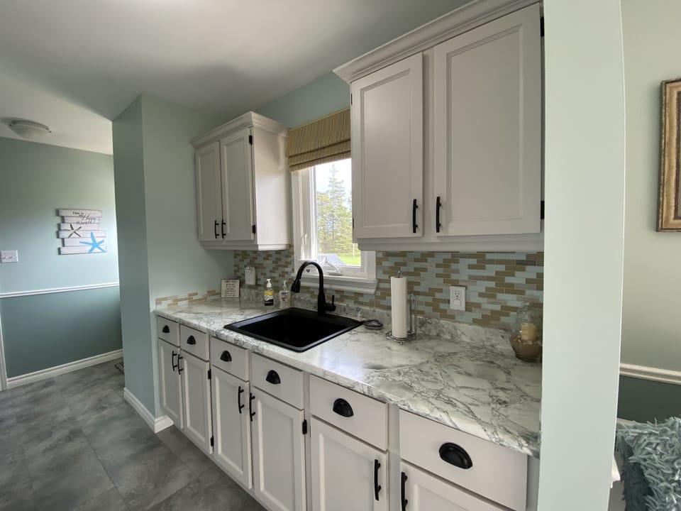 The renovated kitchen. Love the new color.