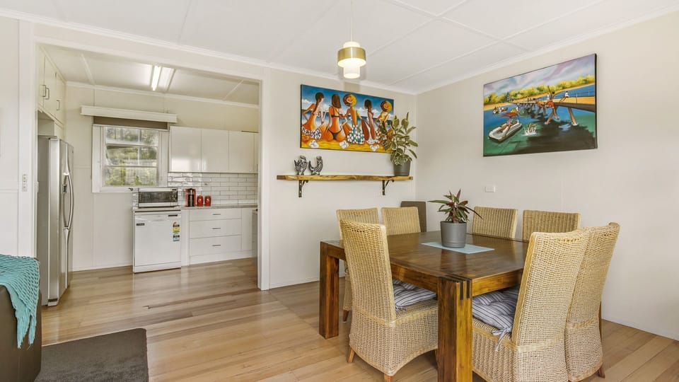 Dining room into Kitchen with dishwasher 