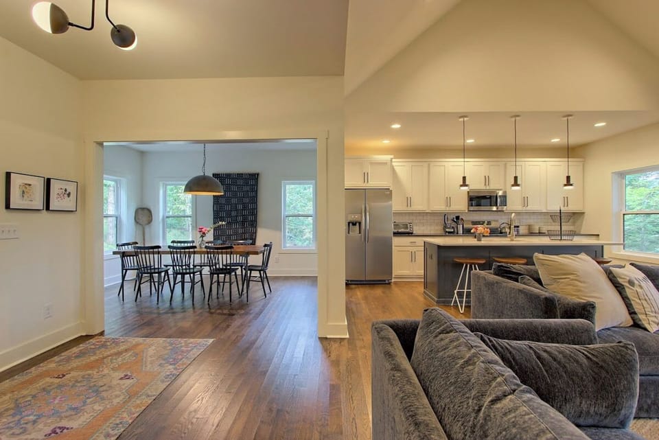 View of the dining room next to the kitchen and living room on the main level