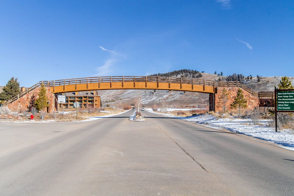 You'll drive right under this rustic bridge on the way to the condo!