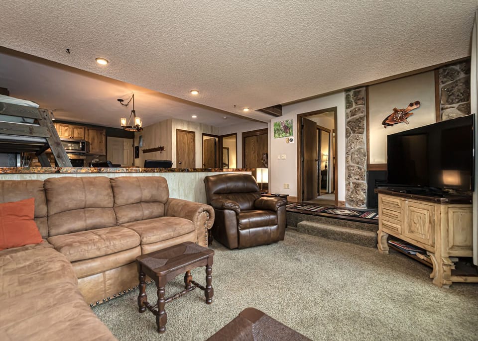 Cozy living room with gas fireplace, Smart TV with cable and Showtime. 