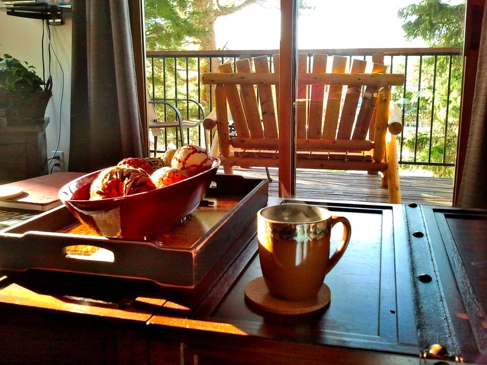 Enjoy the sunrise and mountain view right from the living room