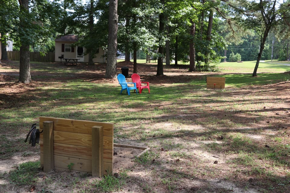 Cabins in groups of 5 in woodland setting 