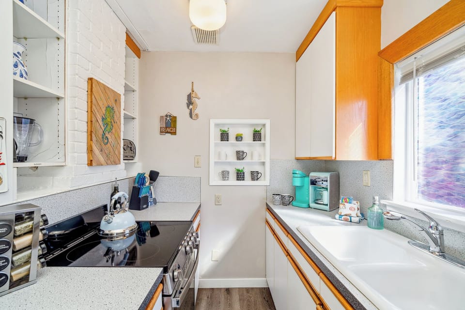 Small but efficient and well stocked kitchen!