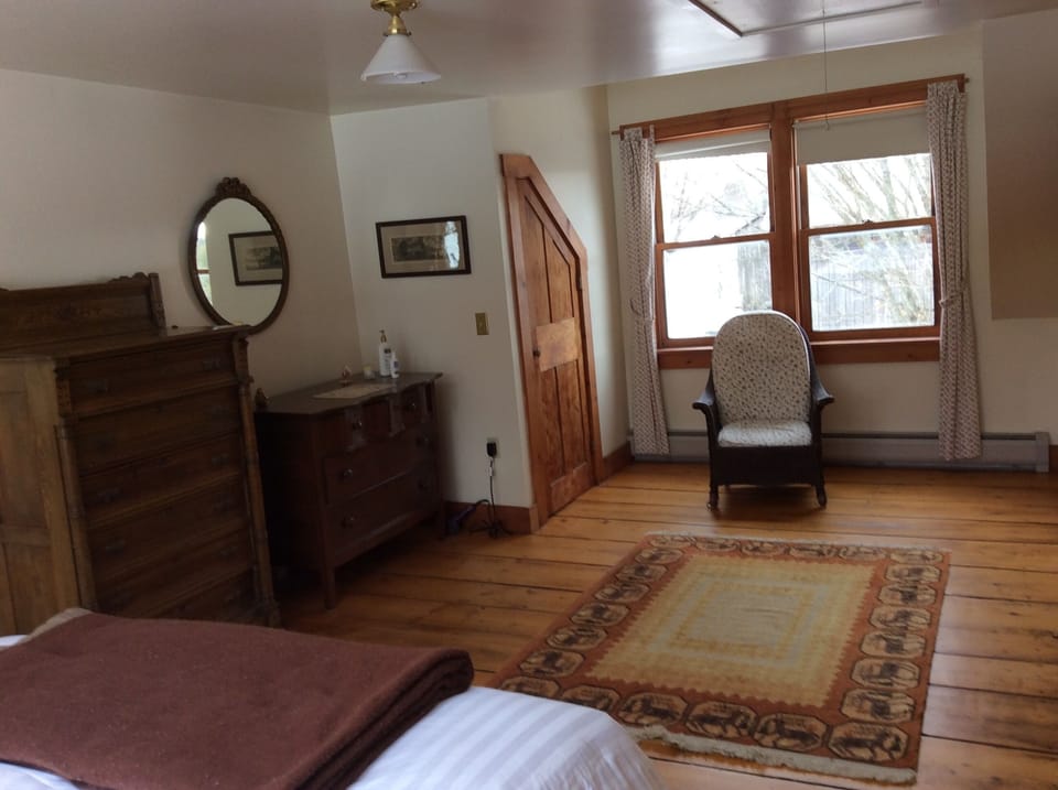 Master bedroom, two dressers, ample closet space.
