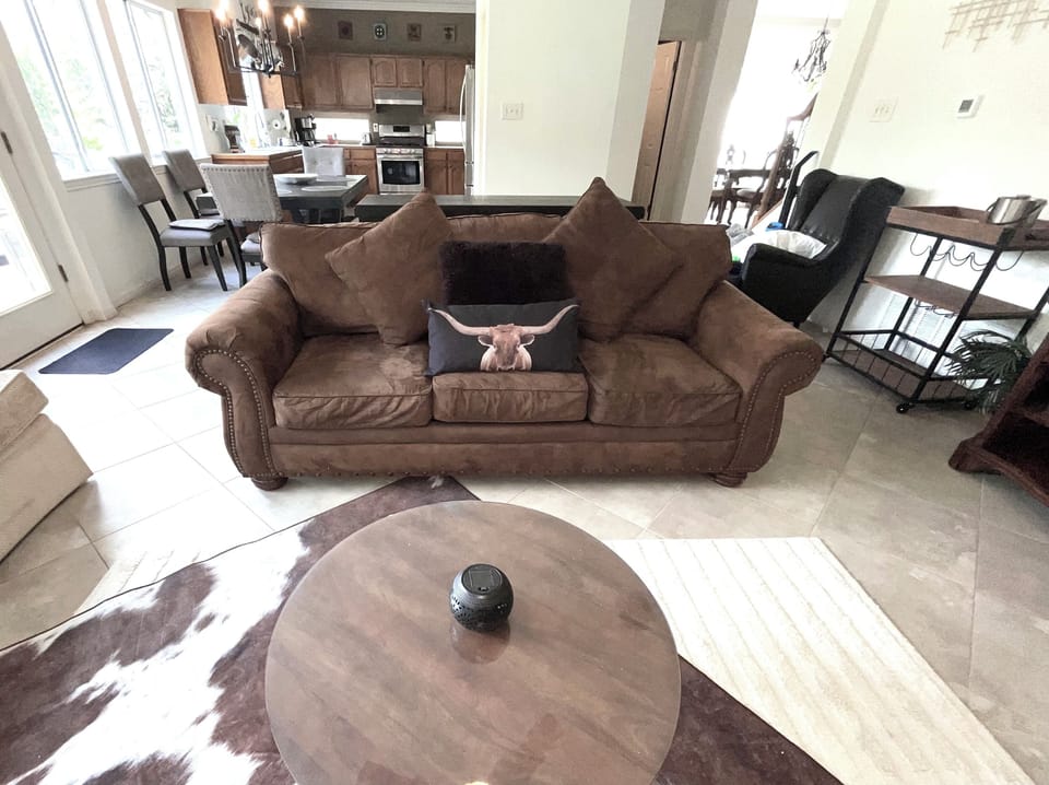 Open floor plan is great for gatherings. Queen sleeper features gel memory foam.