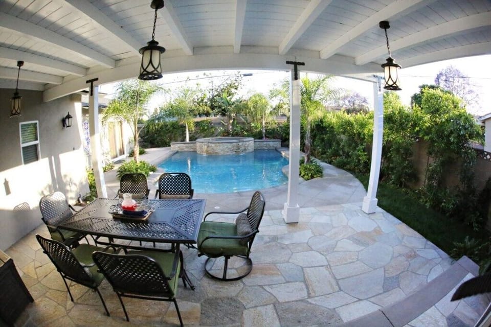 Spacious Outdoor Covered Patio Dining and Stunning Pool view 2