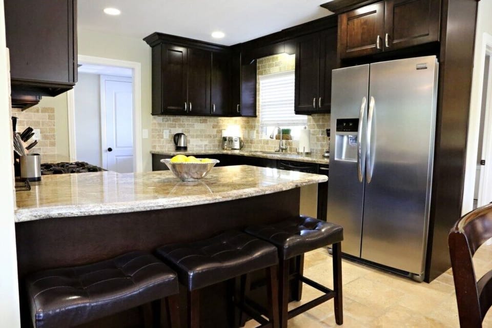 Custom Kitchen with Stainless Steel Appliances
Partial open concept kitchen with granite counter tops 