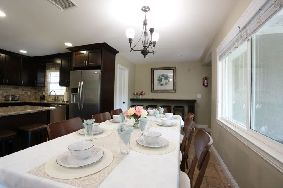Dining Room and Custom Kitchen with Stainless Steel Appliances
Dining Room and Kitchen. Dining has seating for 10 plus a