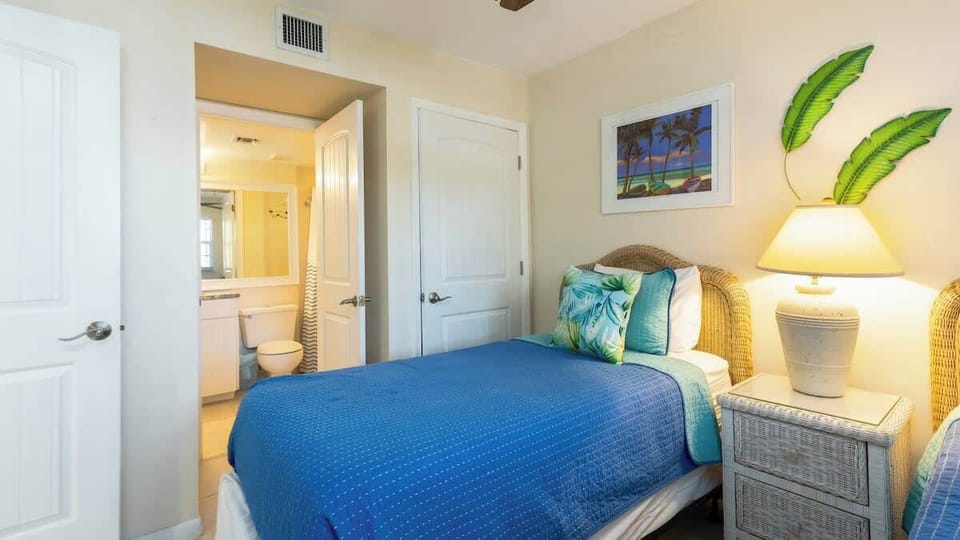 Secondary Bedroom with Clothing Storage and Connected Bathroom 
