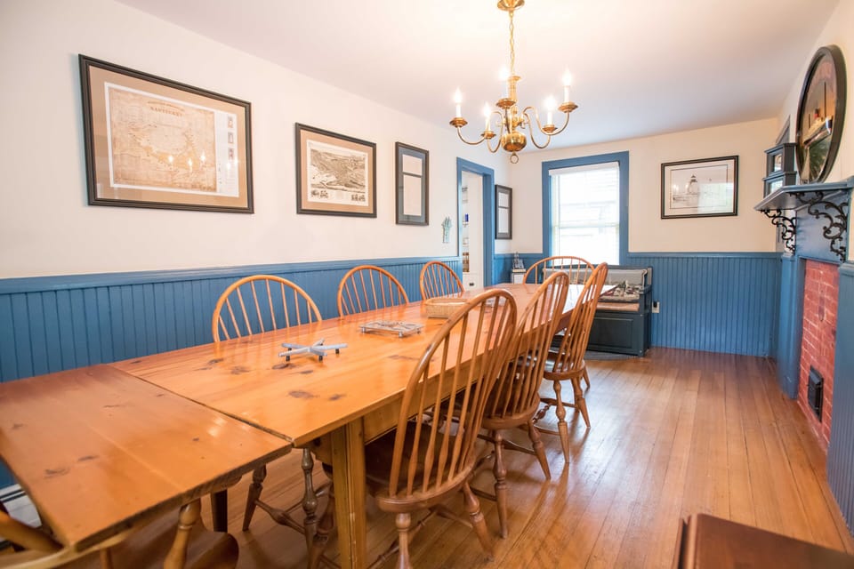 Dining Room with side table and bench, seats 11 with extra chairs