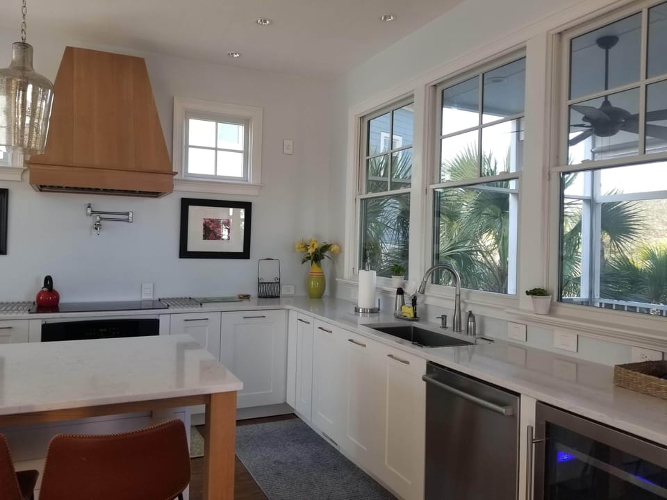 Added 5 new windows for additional sunlight and spectacular views of backyard 