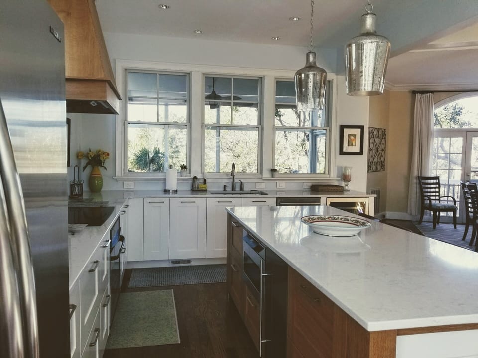 Custom cabinets w/ microwave drawer, under counter ice maker  & beverage fridge