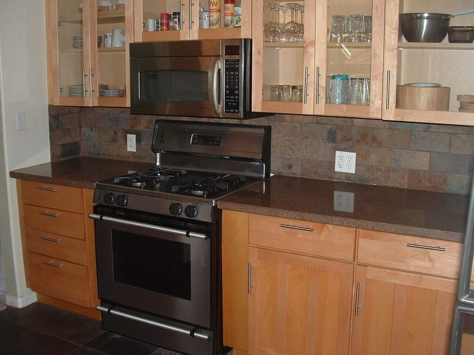 Kitchen, dinner ware, utensils, cookware all provided