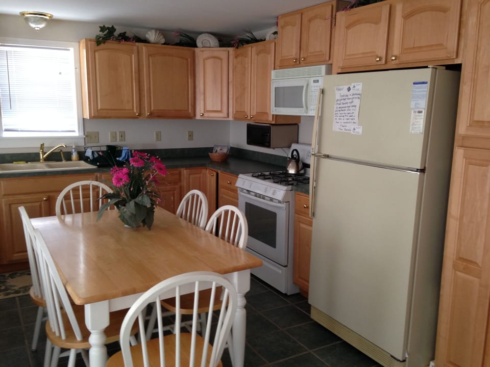 View of kitchen and maple cabinets