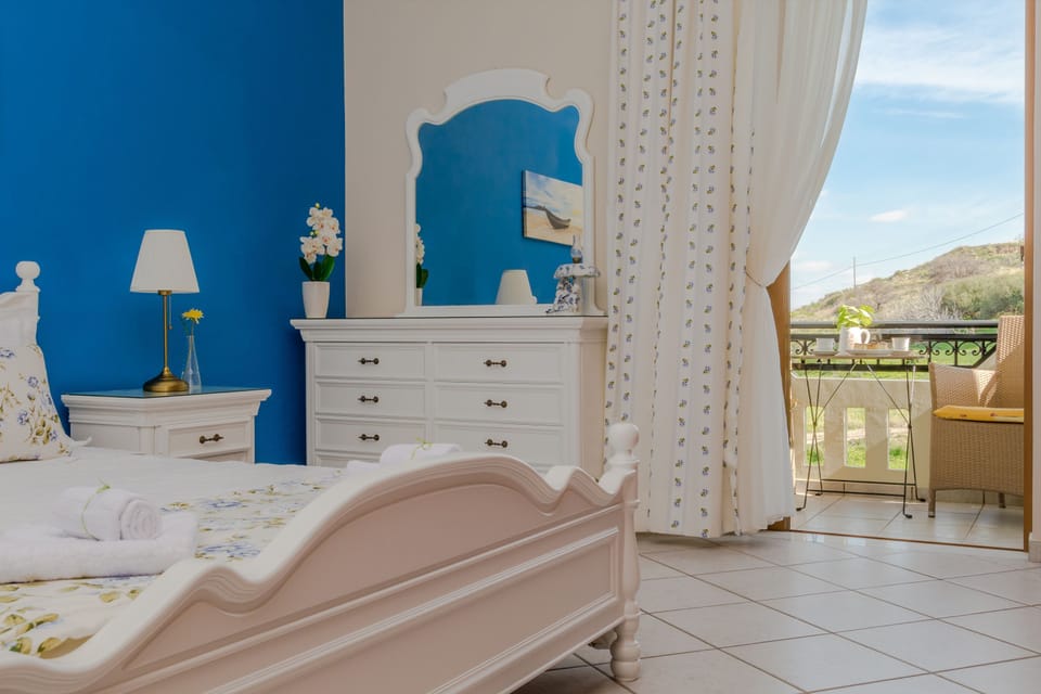 master bedroom with private balcony. airconditioned