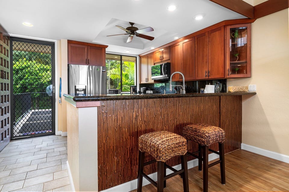 Entrance to Home with Fully Equipped Kitchen and Bar Seating