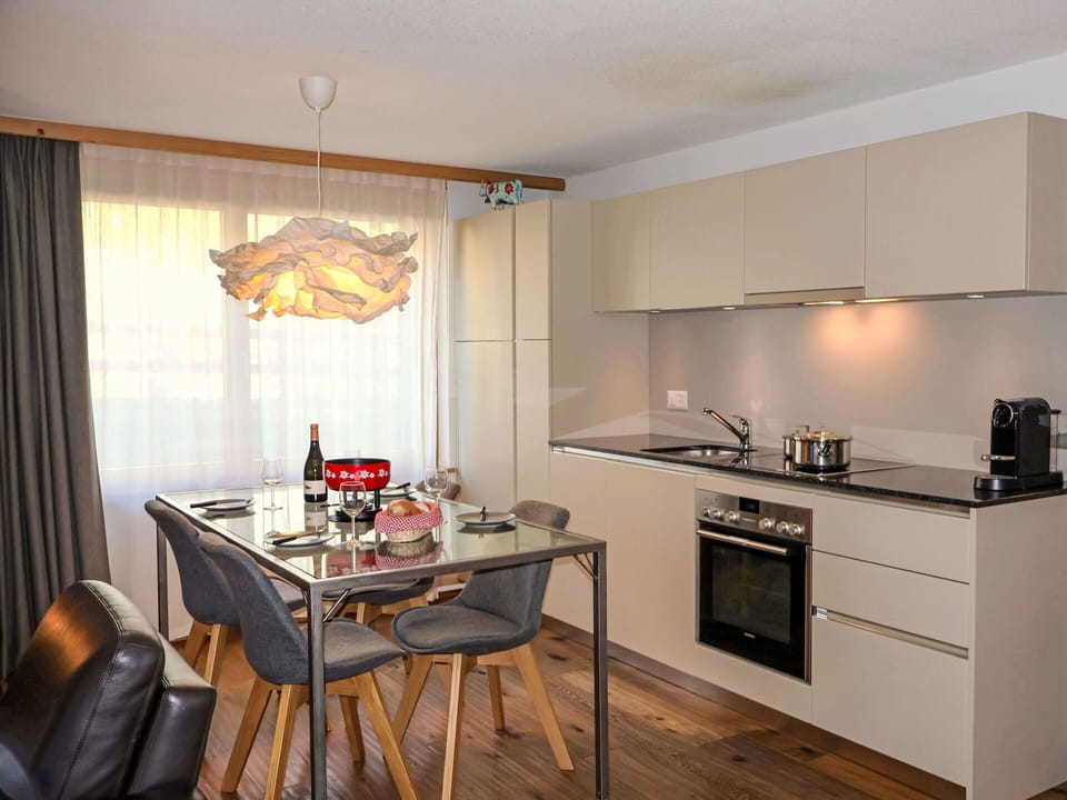 Furniture, Kitchen, Interior Design, Countertop, Flooring, Kitchen Appliance, Cabinetry, Wood, Light Fixture, Room
