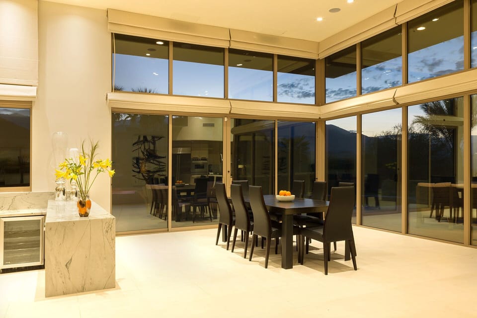 Patio sliders lead to outdoor space