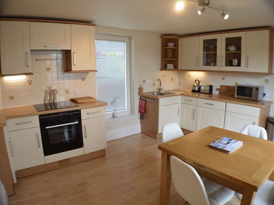 The fully fitted kitchen with amazing views