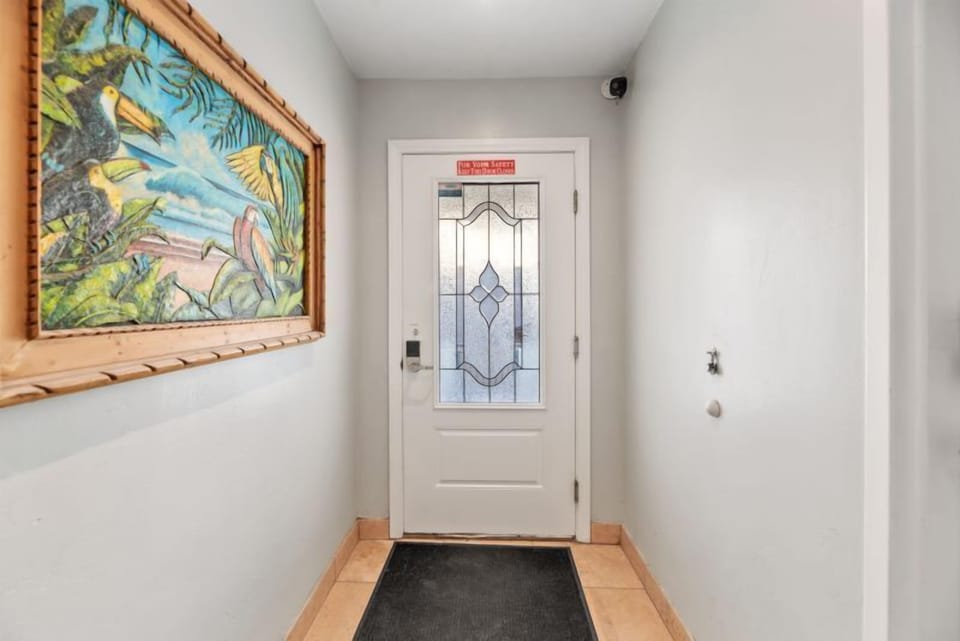 Security entrance to the building - stairs on the left, elevator on the right