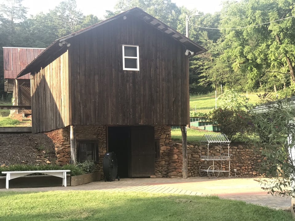 Grain cottage above the rock wine cellar 