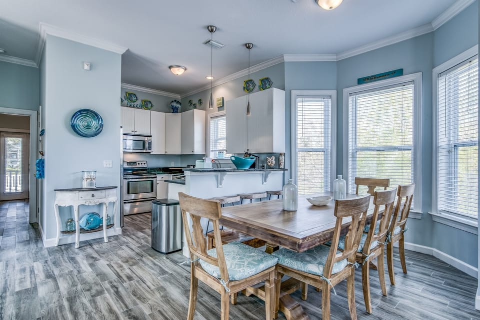 Dining room with seating for 8 at the table plus the kitchen bar. Very open plan