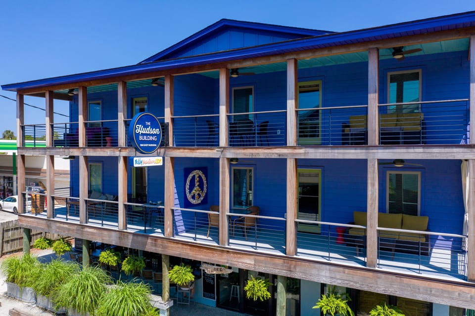 The private balcony of each apartment is large enough to accommodate a full-sized couch, table and chairs, with plenty of open space in-between and fun outdoor décor.
