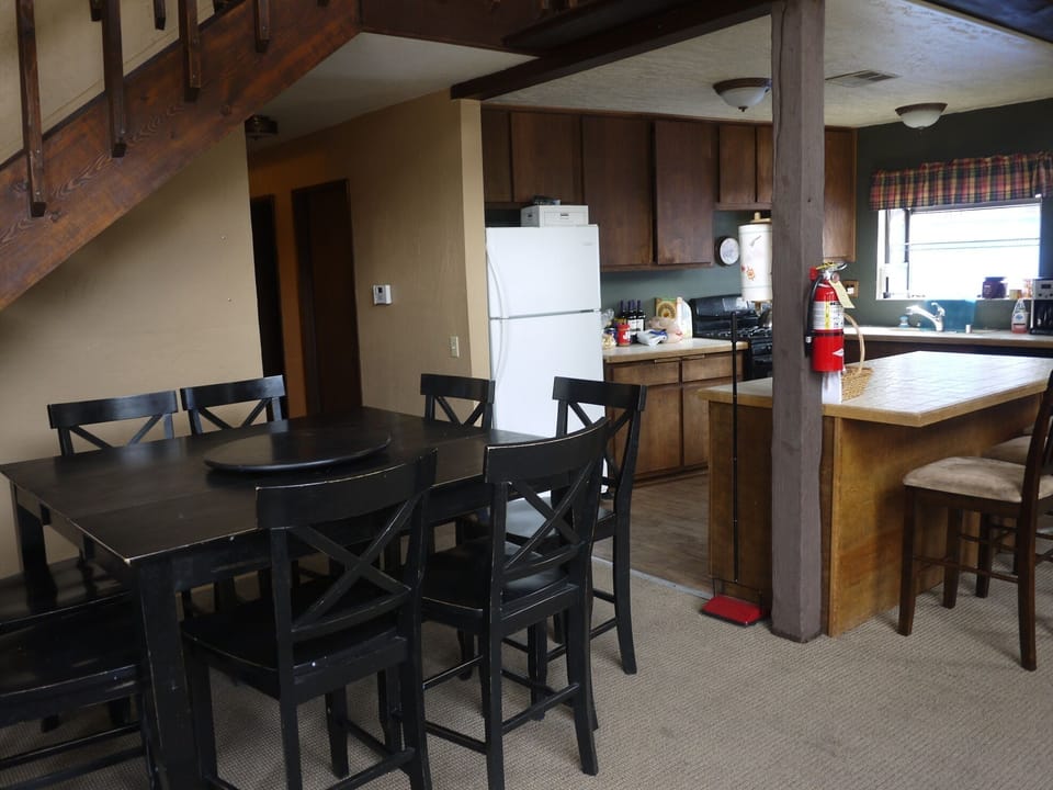 Dining table with counter stools