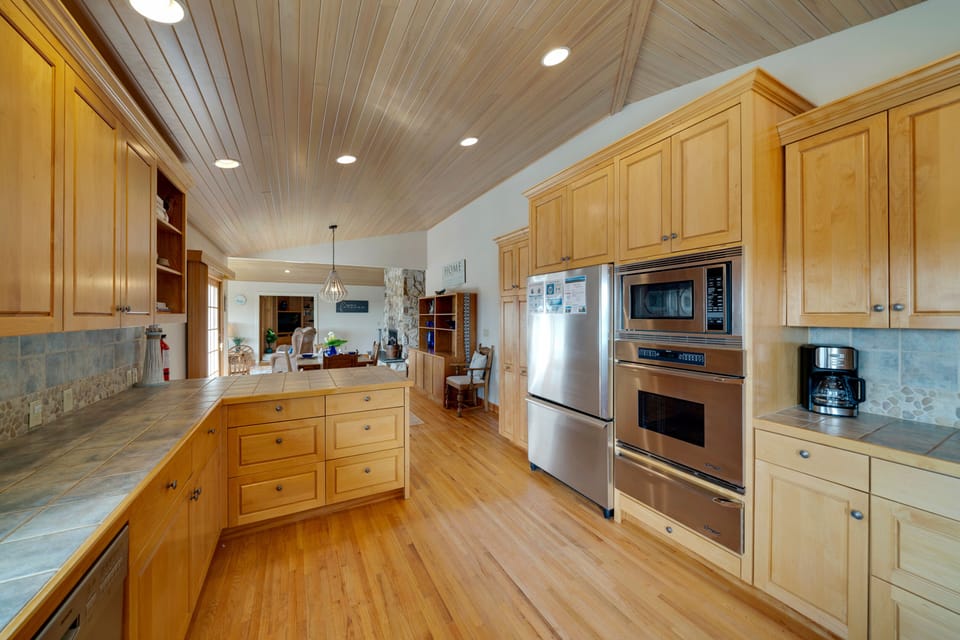 Beautiful kitchen overlooks the dining area and into the living room