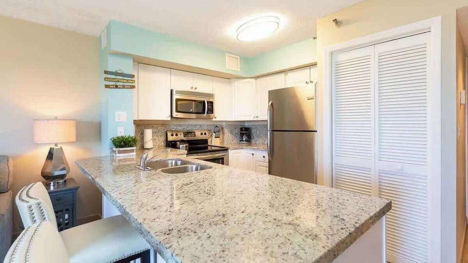 Fully Equipped Kitchen with Appliances and Drip Coffee Maker