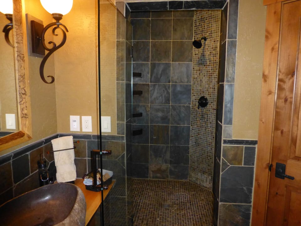 Downstairs bathroom is convenient for guests staying in downstairs king bedroom.