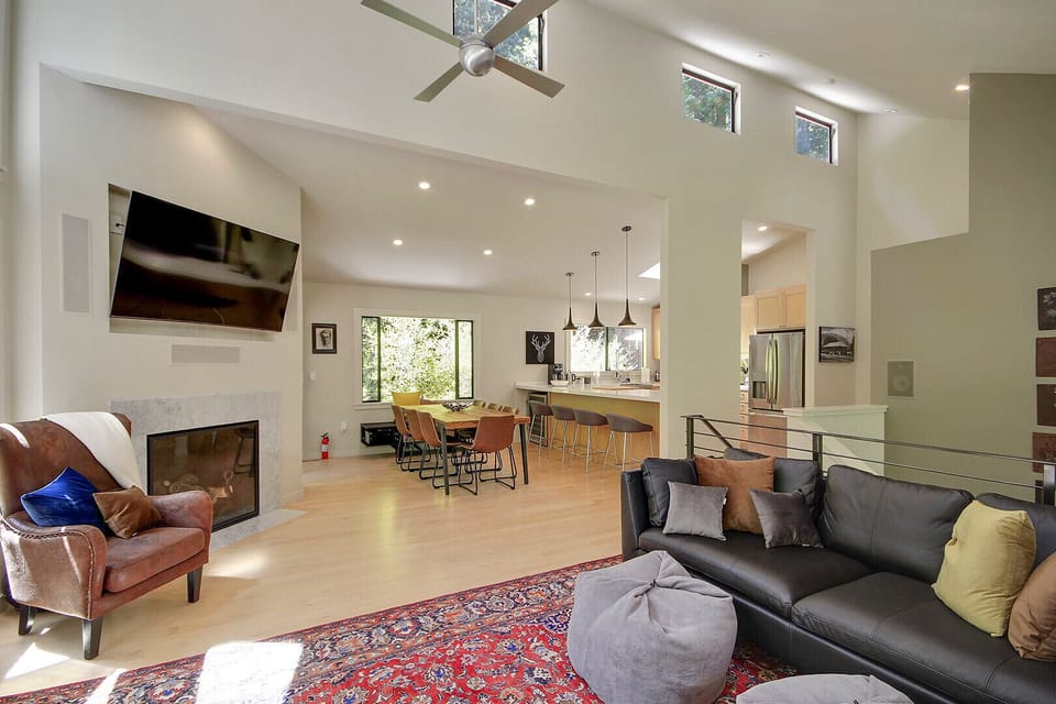 Modern interior and decor touches with comfortable furniture and cathedral ceilings.