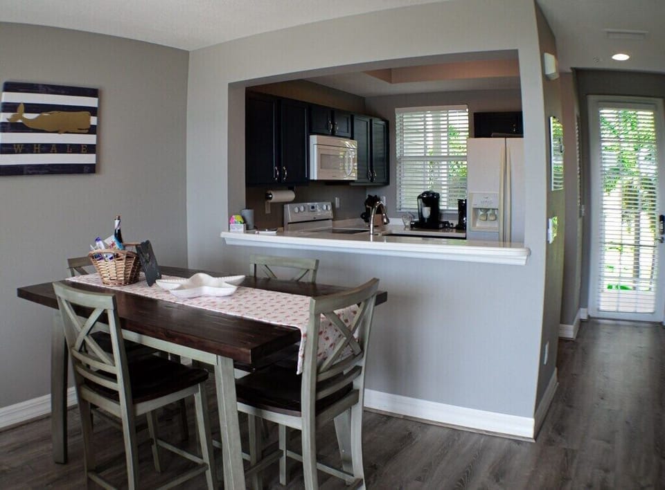 Dining table with easy pass through kitchen access