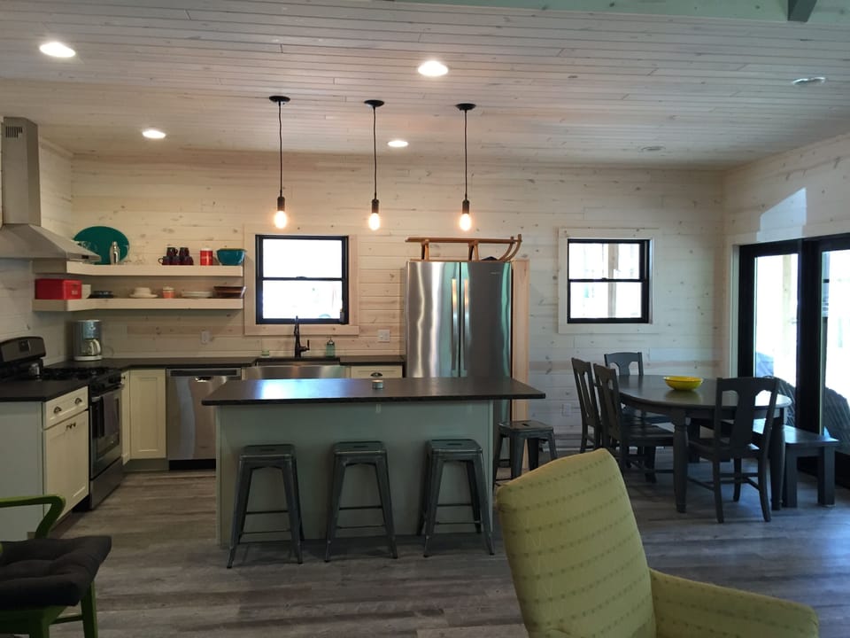 open concept kitchen with stainless appliances 