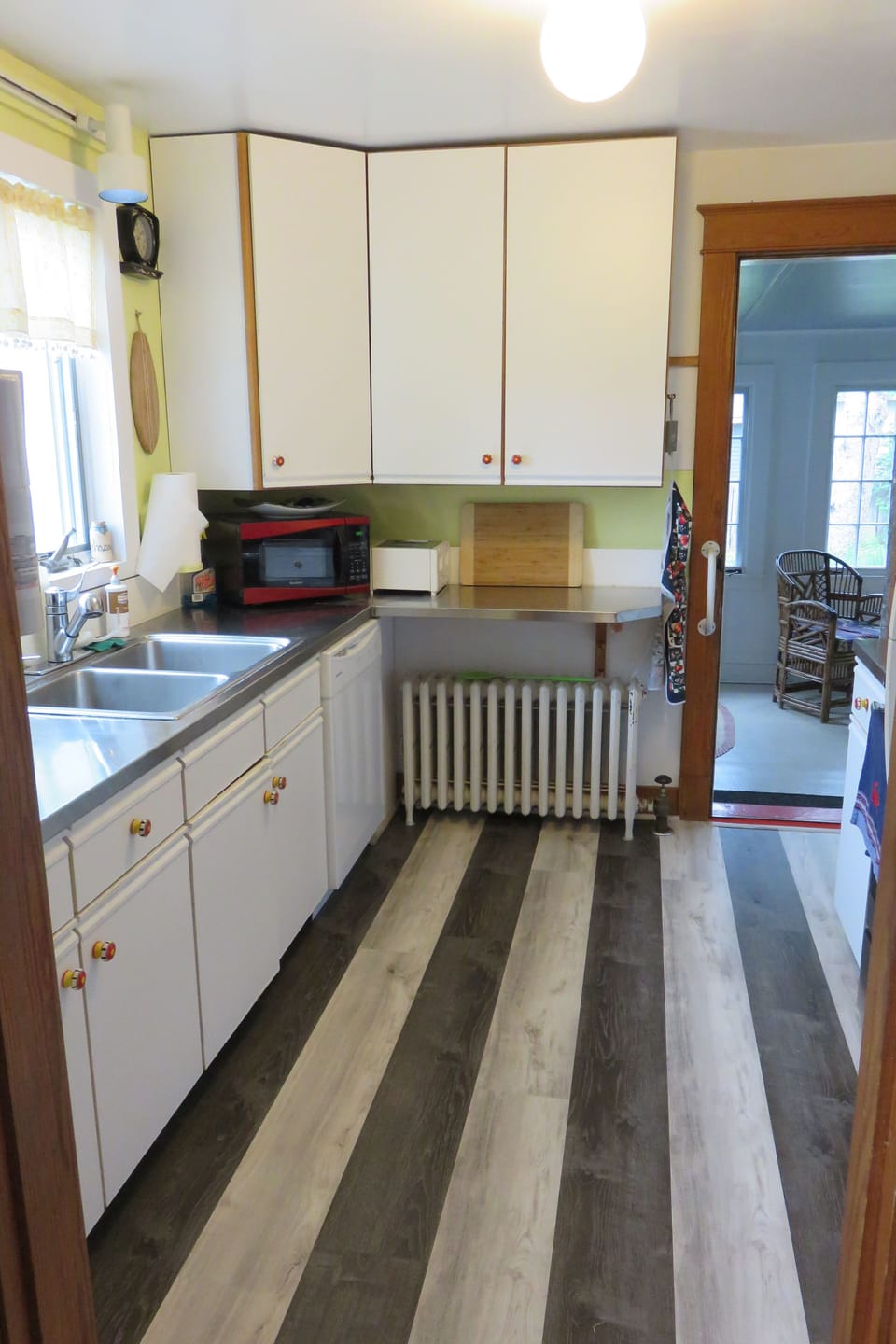 Kitchen showing microwave oven and dishwasher
