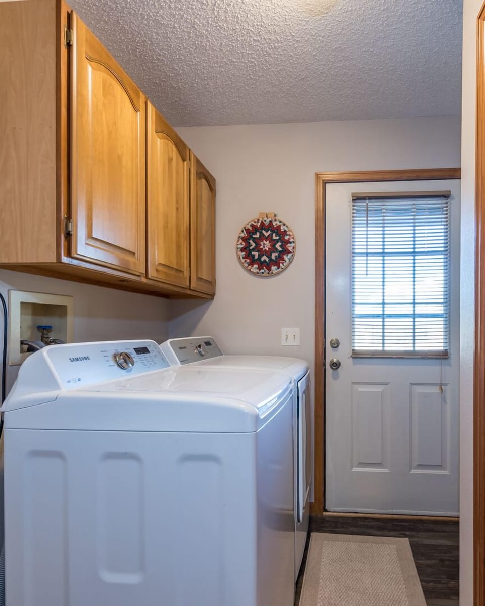 Main level Laundry Room w/Exit to Main Driveway.