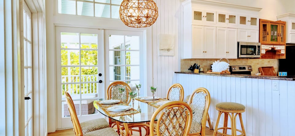 Great room features 2 dining areas for up to 10 people