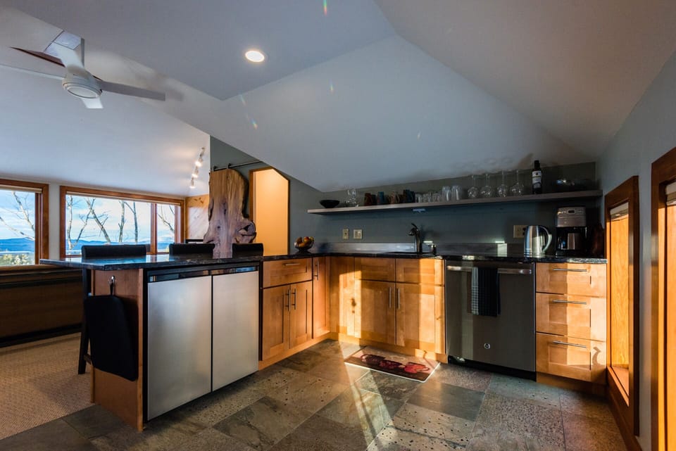 Cabinets are full of gourmet cooking devices.