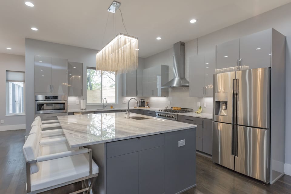 Gourmet kitchen with 6 burner gas stove, 2 sinks, 